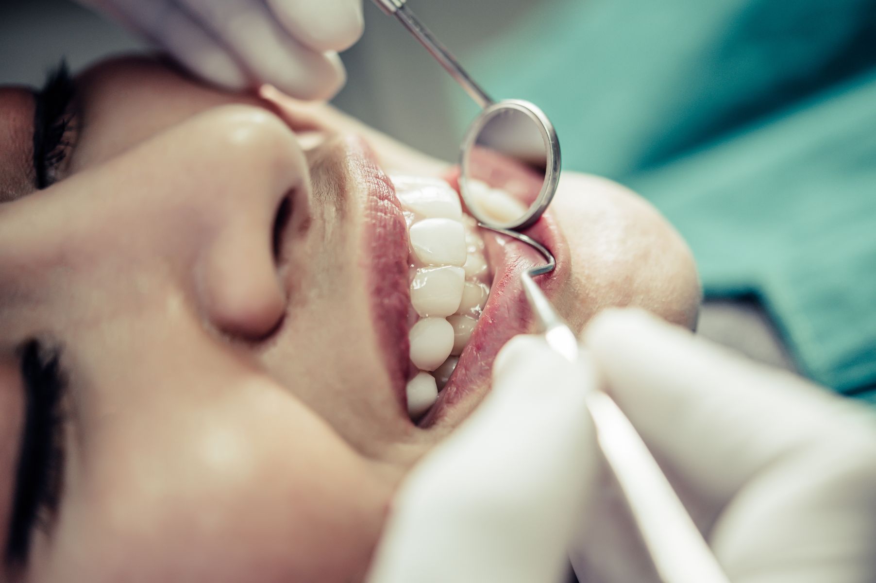 dentists-treat-patients-teeth